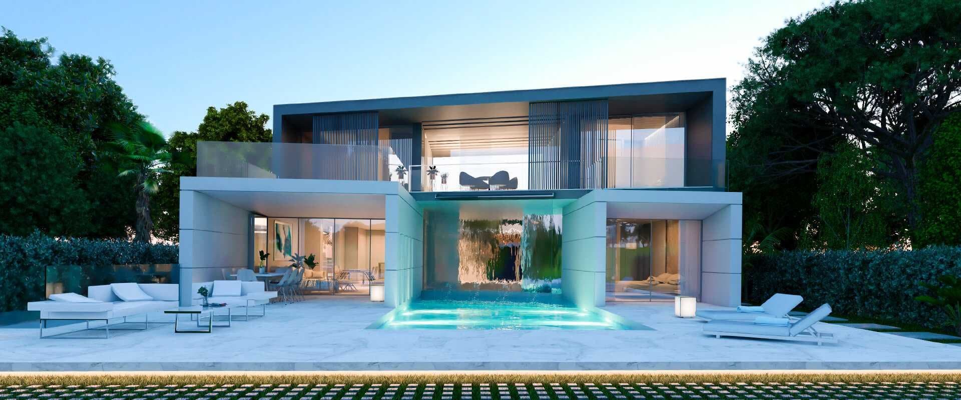 Vivienda unifamiliar moderna con piscina y muro de agua iluminados al atardecer
