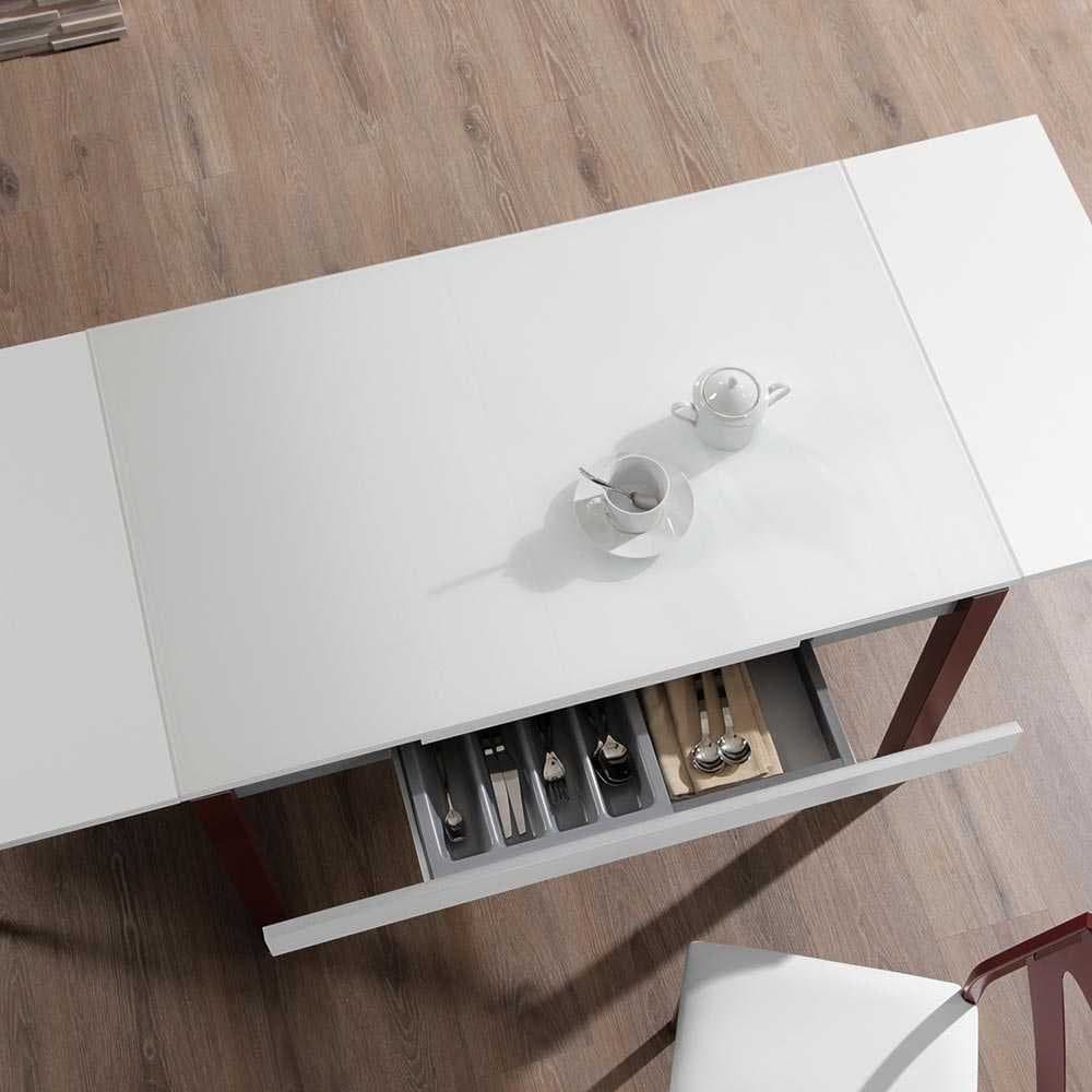 Vista cenital de la mesa Okey extendida mostrando el cajón interior con cubertería